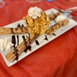 Dora’s Mexican Grill and Cantina - Fried vanilla ice cream with churro. DELICIOUS!