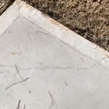 KM Homes - Crack in concrete on the patio - Real Estate Agents Near Me - Alpharetta, Georgia