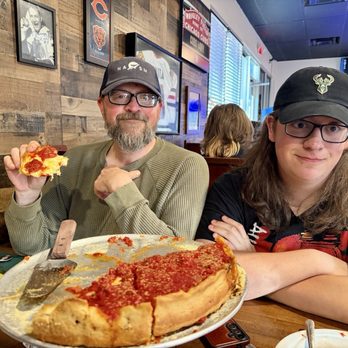 Windy City Pizza - Happy boys eating their deep dish pizza! - Pizza Near Me - Virginia Beach, Virginia Windy City Pizza - Happy boys eating their deep dish pizza! - Pizza Near Me - Virginia Beach, Virginia