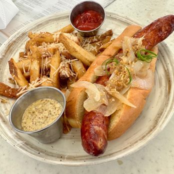 Surfrider Cafe - Grilled kukui sausage with garlic fries. - Cafes Near Me - Honolulu, Hawaii Surfrider Cafe - Grilled kukui sausage with garlic fries. - Cafes Near Me - Honolulu, Hawaii