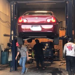Tdp Auto Repair - Shop with employees (owner/operator on left)