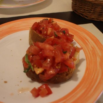 Antico Gatoleto - Bruschetta filled with fresh tomatoes. - Seafood Near Me - Venezia, VE Antico Gatoleto - Bruschetta filled with fresh tomatoes. - Seafood Near Me - Venezia, VE