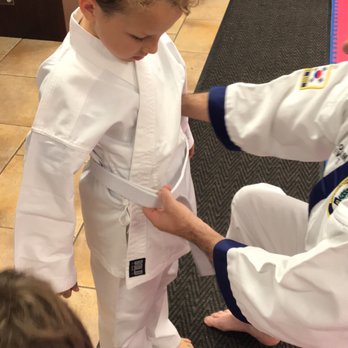 PKSA Karate OC - Little man getting his belt tied for the first time! - Karate Near Me - Lake Forest, California PKSA Karate OC - Little man getting his belt tied for the first time! - Karate Near Me - Lake Forest, California