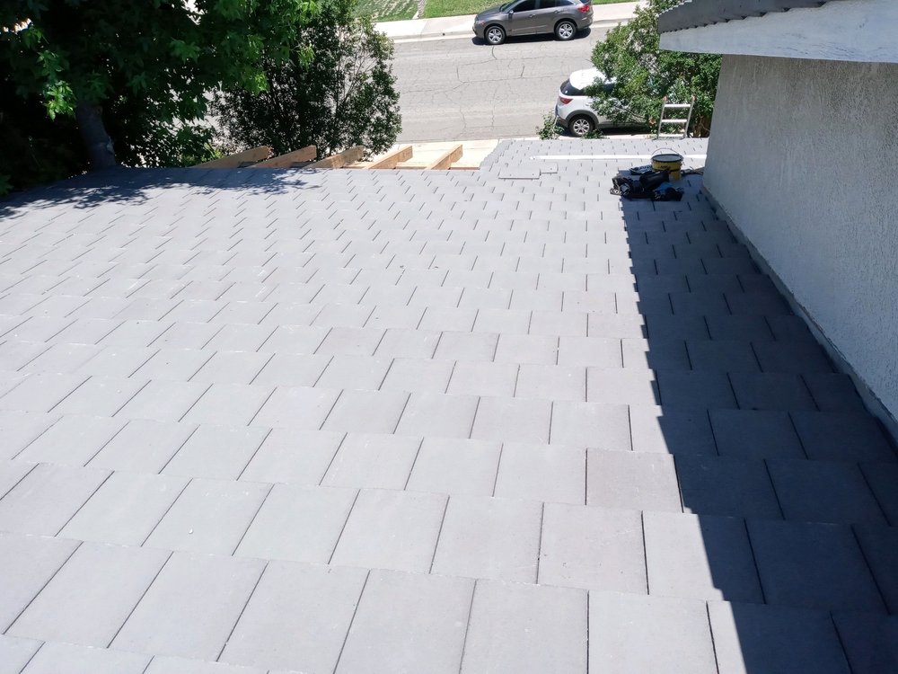 Slide of J P Roofing