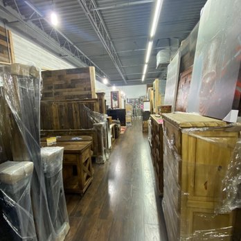 Lone Star Rustic - Last walkway in. Bed frames, dressers, tables with seatings. - Furniture Stores Near Me - Crowley, Texas