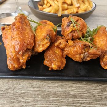 Merchant and Trade - Buffalo wings - Cocktail Bars Near Me - Charlotte, North Carolina Merchant and Trade - Buffalo wings - Cocktail Bars Near Me - Charlotte, North Carolina