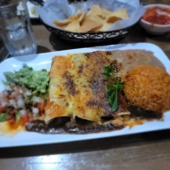 Santa Fe Grill & Bar - Enchiladas Tres Amigos. Red was good, mole was OK, green was fine. OK - Mexican Near Me - Bronx, New York Santa Fe Grill & Bar - Enchiladas Tres Amigos. Red was good, mole was OK, green was fine. OK - Mexican Near Me - Bronx, New York