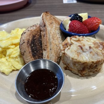 Snooze, an A.M. Eatery - Kids plate (Rye bread, scrambled eggs and potatoes) - Breakfast & Brunch Near Me - Orange, California Snooze, an A.M. Eatery - Kids plate (Rye bread, scrambled eggs and potatoes) - Breakfast & Brunch Near Me - Orange, California