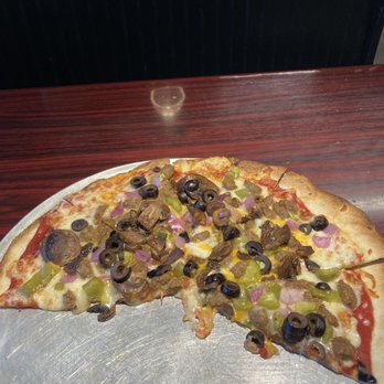 Hot Stone - yet to be devoured, remaining portion of "The Stone" pizza, sans pepperoni - Pizza Near Me - Wynne, Arkansas