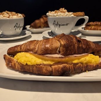 Artigiano - Ham and Egg Croissant Sandwich - Coffee & Tea Near Me - Burnaby, British Columbia Artigiano - Ham and Egg Croissant Sandwich - Coffee & Tea Near Me - Burnaby, British Columbia