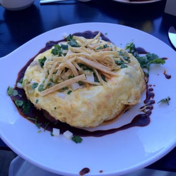 Splashes Restaurant - Their version of "huevos rancheros". Great mole sauce. - New American Near Me - Laguna Beach, California Splashes Restaurant - Their version of "huevos rancheros". Great mole sauce. - New American Near Me - Laguna Beach, California