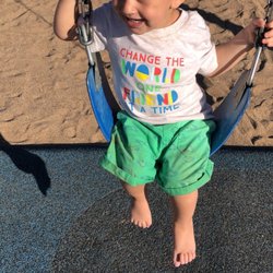 Paseo Verde Park - Swinging on the swings