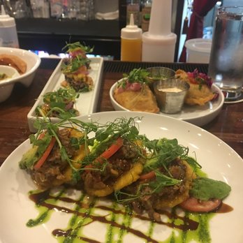 Savorez - Clockwise (from the top left): Tuna Tostadas, Empanadas and the BLT Arepas. - Latin American Near Me - Wilmington, North Carolina Savorez - Clockwise (from the top left): Tuna Tostadas, Empanadas and the BLT Arepas. - Latin American Near Me - Wilmington, North Carolina