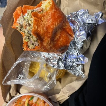 Los Cantaros - From lower left to upper right: Extra side of pico, small bag of chips (delish), super burrito with carne asada and a tomato tortilla wrap - Mexican Near Me - San Leandro, California