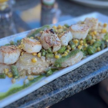 Bluewater Grill - Temecula - Scalloped potatoes topped with corn, asparagus & scallops. - Seafood Near Me - Temecula, California Bluewater Grill - Temecula - Scalloped potatoes topped with corn, asparagus & scallops. - Seafood Near Me - Temecula, California