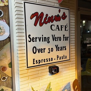 Nino's Cafe - a sign for serving vero for over 30 years espresso pasta - Italian Near Me - Vero Beach, Florida