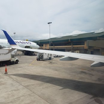 United Airlines - Sitting on a very last row of United Airlines - Airlines Near Me - Kahului, Hawaii United Airlines - Sitting on a very last row of United Airlines - Airlines Near Me - Kahului, Hawaii