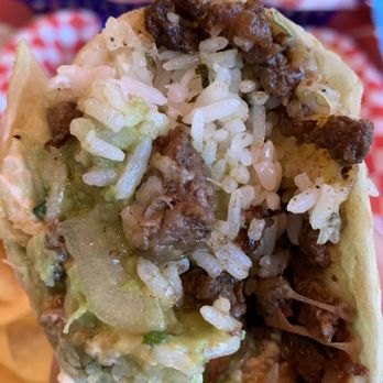 Tiki Taco - Burrito with rice and carne asada - Desserts Near Me - Overland Park, Kansas Tiki Taco - Burrito with rice and carne asada - Desserts Near Me - Overland Park, Kansas