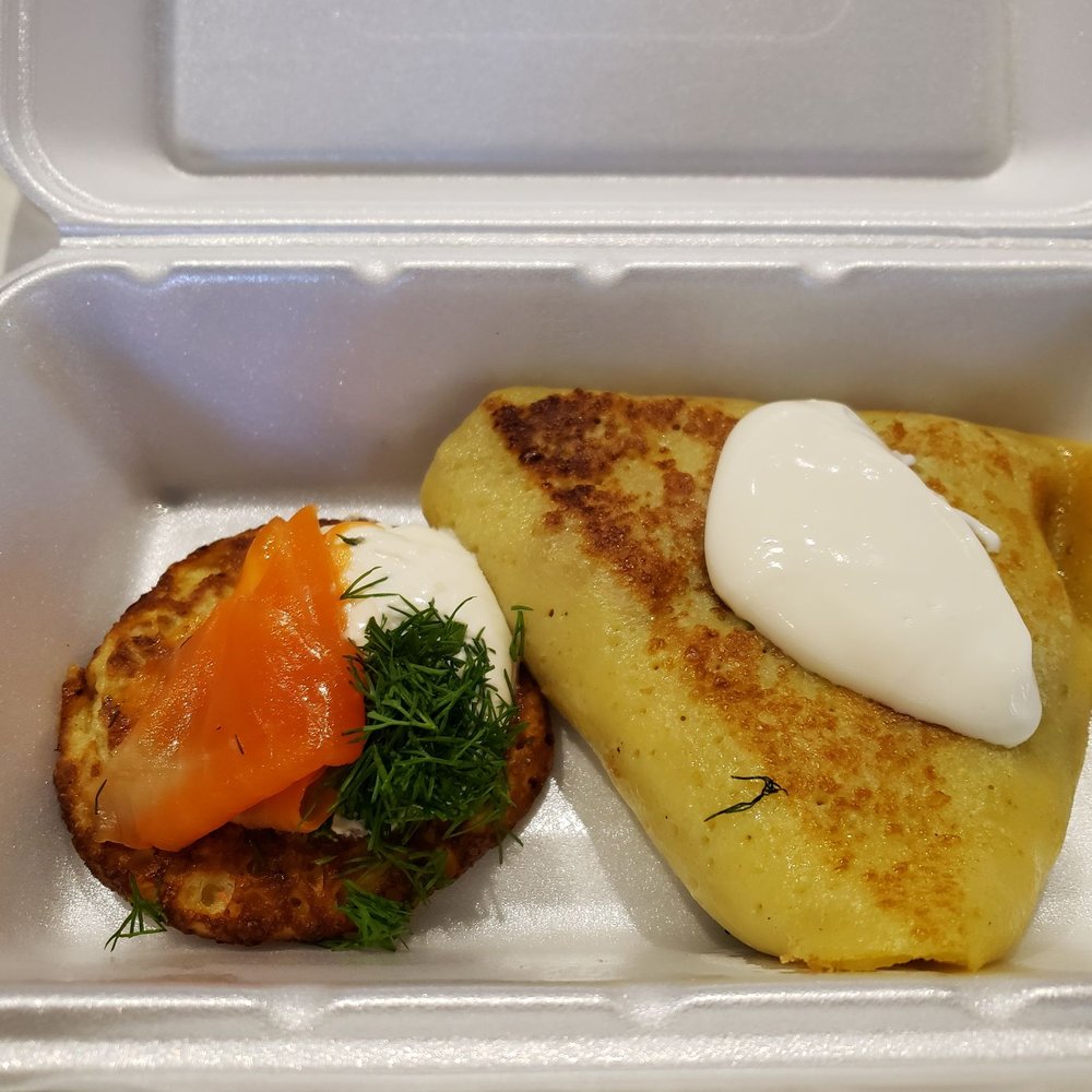 Potato latke with salmon, dill and cream cheese, and a spinach and mushroom blintz.