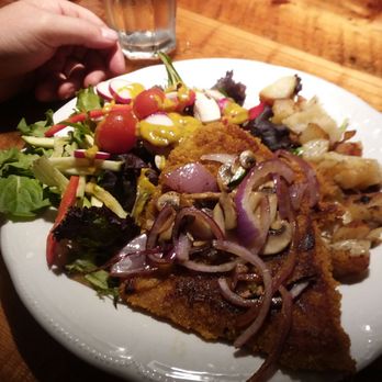 Leonhard's Café & Restaurant - Pork schnitzel with salad. Both good. Mediocre fried potatoes. - Coffee & Tea Near Me - Charlottetown, Prince Edward Island