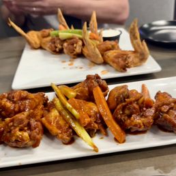 Whole wings in the back, party wings in the front Whole wings in the back, party wings in the front
