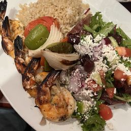 Wild shrimp kabob with brown rice and Mediterranean salad Wild shrimp kabob with brown rice and Mediterranean salad