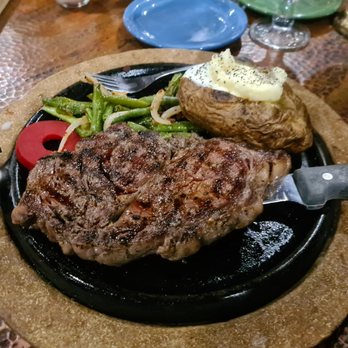 Western View Steakhouse - Basic ribeye medium rare with baked potato and beans! Perfect - Steakhouses Near Me - Williams, Arizona Western View Steakhouse - Basic ribeye medium rare with baked potato and beans! Perfect - Steakhouses Near Me - Williams, Arizona