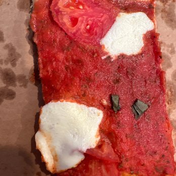 Santucci's Original Square Pizza - A slice of their Margharita pizza. - Pizza Near Me - Philadelphia, Pennsylvania Santucci's Original Square Pizza - A slice of their Margharita pizza. - Pizza Near Me - Philadelphia, Pennsylvania