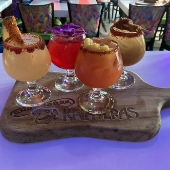 Kalaveras - Margarita sampler. They light the board on fire. - Cocktail Bars Near Me - Hollywood, California Kalaveras - Margarita sampler. They light the board on fire. - Cocktail Bars Near Me - Hollywood, California