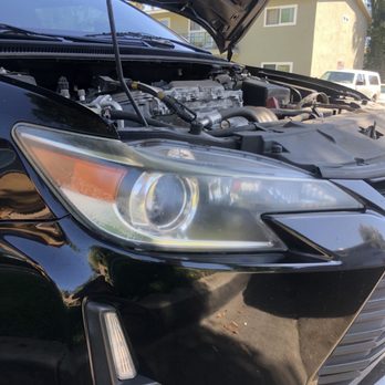 Headlight Restoration & Auto Detailing Specialist - BEFORE- passenger side - Auto Detailing Near Me