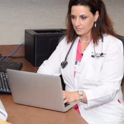 Tayma Shaya, MD - You will likely never see me in a white coat, but we got fancy for this picture