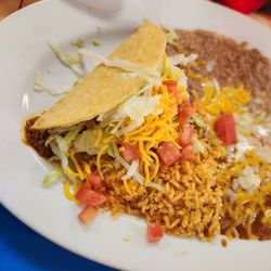 Puerto Vallarta Family Mexican Restaurant - Combination plate of beef taco and cheese enchilada.