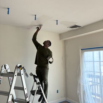 Golden Key Advisors - Our crew at work with plastering any imperfections in the ceiling to prep for paint - Carpenters Near Me - Boston, Massachusetts