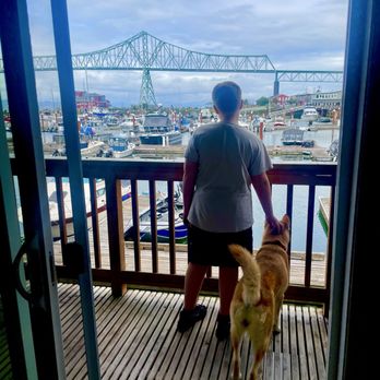 Astoria Riverwalk Inn - Grandson with our pup. - Hotels Near Me - Astoria, Oregon Astoria Riverwalk Inn - Grandson with our pup. - Hotels Near Me - Astoria, Oregon