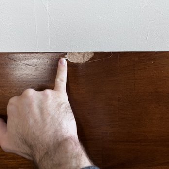 The Moving Experience - large gash in dining table - Movers Near Me - San Luis Obispo, California The Moving Experience - large gash in dining table - Movers Near Me - San Luis Obispo, California