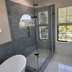 Orlando’s Glass And Mirror Works - 90 degrees Custom Frameless Shower Enclosure