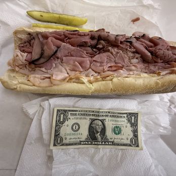 The Deli - A pic of my complete Super Smokey sub. The dollar bill is for size reference. Huge and delicious! - Delis Near Me - Leesburg, Virginia The Deli - A pic of my complete Super Smokey sub. The dollar bill is for size reference. Huge and delicious! - Delis Near Me - Leesburg, Virginia