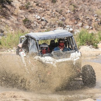 Cabo Adventures - UTV side by side. Going through the small creek. - Boat Tours Near Me - Cabo San Lucas, BCS Cabo Adventures - UTV side by side. Going through the small creek. - Boat Tours Near Me - Cabo San Lucas, BCS