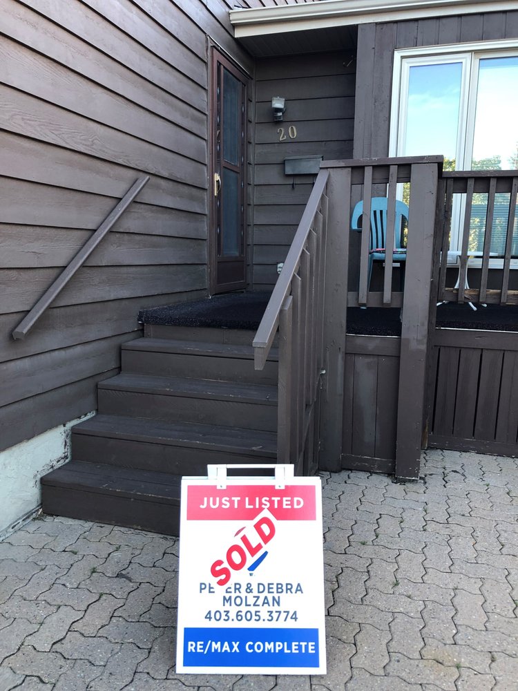 DEBRA AND PETER MOLZAN RE/MAX COMPLETE REALTY Updated July 2024
