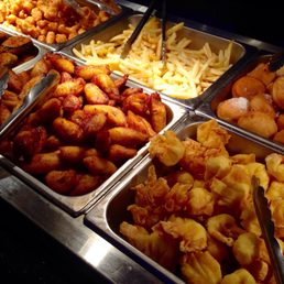 Fried selection: plantains, wontons, French fries, zucchini