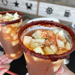 Michelada regular comes with Jícama, cucumber & cause on rim