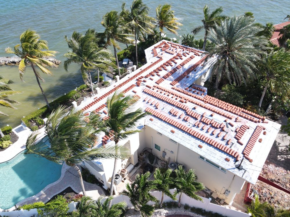 Slide of TJ Platinum Roofing