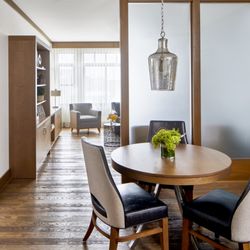 The Hotel Landing - At an expansive 750 square feet, our luxury suite includes a separate living room and dining area with wet bar.