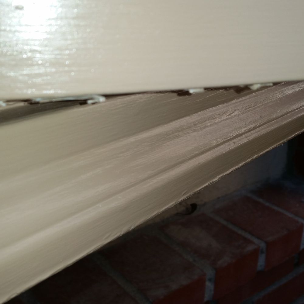 Ed Gonzalez Painting - Broken weather stripping just painted over instead of being removed. - Painters Near Me - Long Beach, California Ed Gonzalez Painting - Broken weather stripping just painted over instead of being removed. - Painters Near Me - Long Beach, California