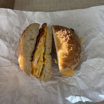 Luke's New York Bagels - Bacon, egg, & cheese on a toasted Asiago bagel - Breakfast & Brunch Near Me - Gainesville, Florida