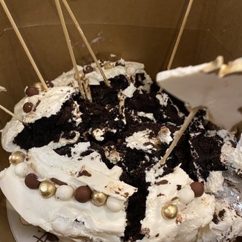 Bakers of Buffington - a chocolate cake with white frosting and sprinkles - Bakeries Near Me - Downingtown, Pennsylvania Bakers of Buffington - a chocolate cake with white frosting and sprinkles - Bakeries Near Me - Downingtown, Pennsylvania