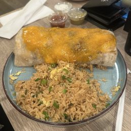 The burrito, chicken and waffles, and fried chicken special The burrito, chicken and waffles, and fried chicken special