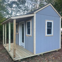 That Shed Guy - 8x12 with a nice little 4x12 porch.  This one is not painted yet but still looks nice.