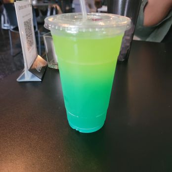 Dessence Cafe - Sour apple lemonade with a "mystery" splash per the waitress - Seafood Near Me - East Point, Georgia