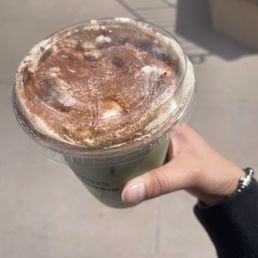 what I believe to be a dusted cinnamon topping for my morning matcha